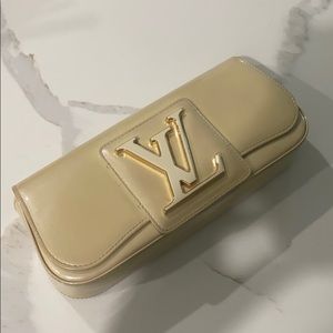 Louis Vuitton patent leather clutch. LV LOGO